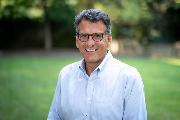 A picture of Howard Wolf smiling