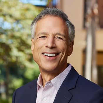 A picture of Peter DeMarzo smiling