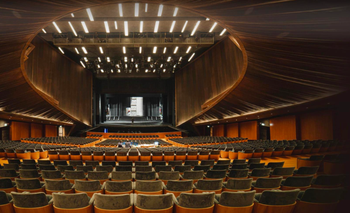 Interior of the Teatro del Maggio Musicale Fiorentino, specifically the main wooden opera hall.